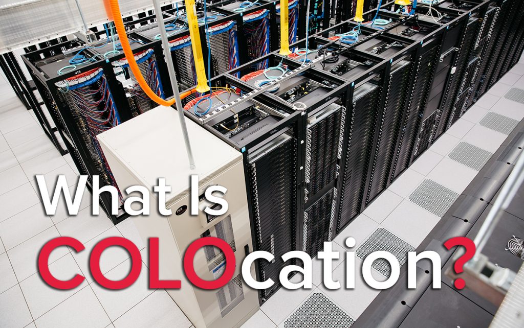 What is Colocation? Top down image of a server room with multiple server cabinets