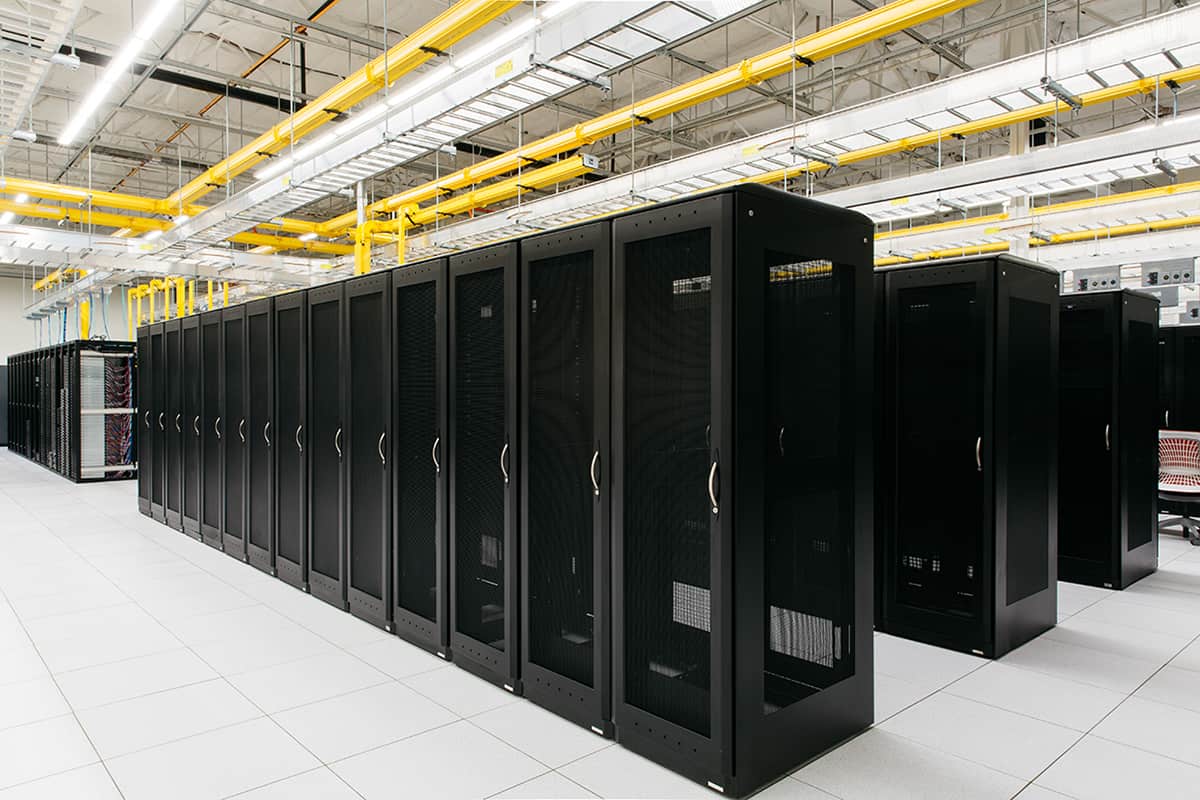 Rows of server cages standing inside a Hivelocity data center