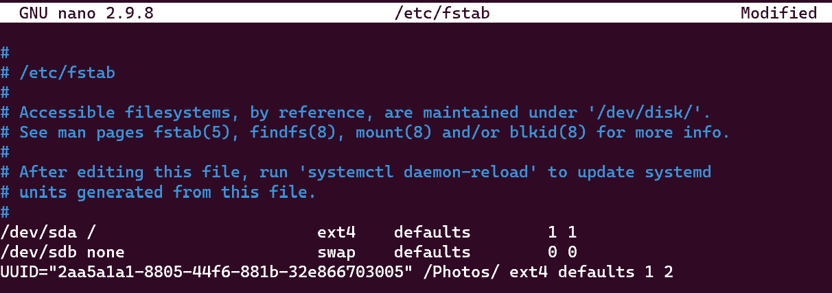 Screenshot showing edits being made to the /etc/fstab file to include the UUID of the newly created partition