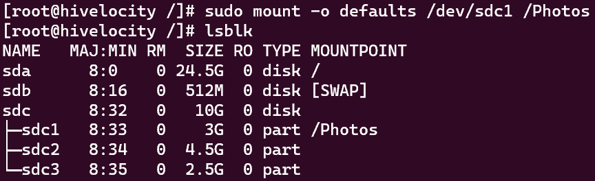 Screenshot showing the results of the "sudo mount -o defaults /dev/sdc1 /Photos" command